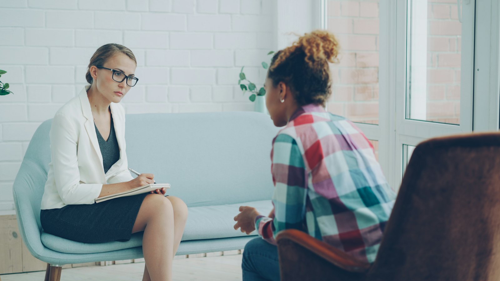 A therapist listening during a counseling session